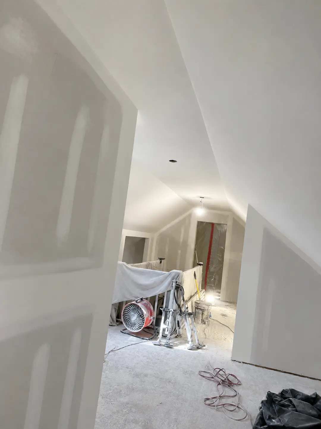 Skim coated drywall in an attic renovation