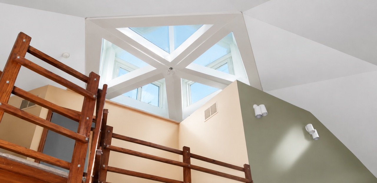 Vaulted ceiling drywall and skylight renovation